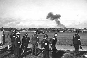 Smoke rising from the wreckage of another Vultee Vengeance dive-bomber which crashed
