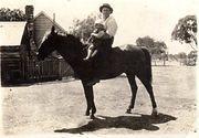 Will Alexander and Harold on horseback