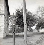 Subject unknown, hanging on to lamp post outside Buchanan’s General Store in Tarnagulla C1966