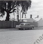 Geoffrey O’Shea’s HD Holden at rear of Fred Williams Butcher’s Shop in Tarnagulla c1966